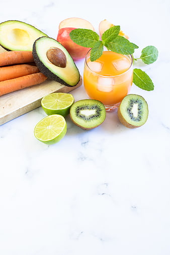 Fresh Healthy Smoothie Ingredients on White Marble Background