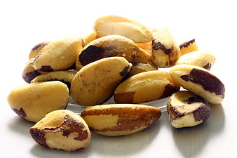 Pile of Raw Brazil Nuts on White Background