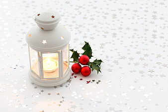 White Christmas Lantern With Candle And Holly Berries On Starry Background