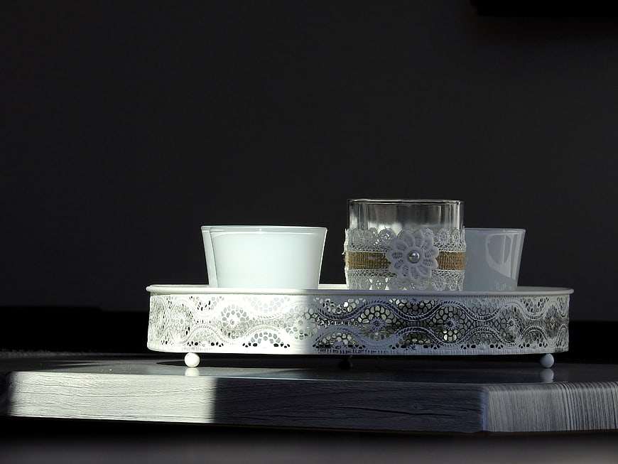 White Lace Tray with Glass Candle Holder on Dark Background