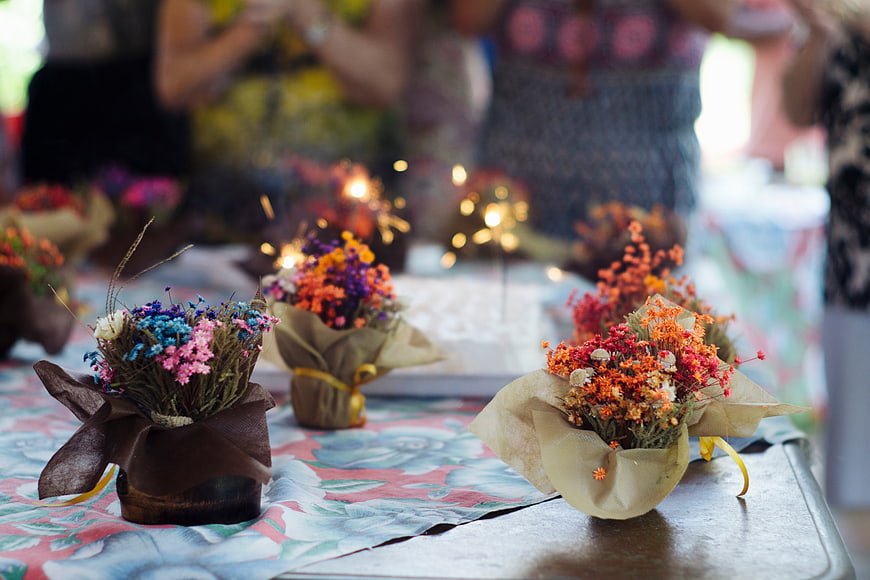 Colorful Dried Flower Bouquets on Floral Tablecloth