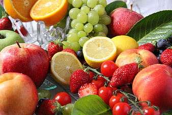 Vibrant Fresh Fruit Arrangement With Citrus, Berries, And Apples