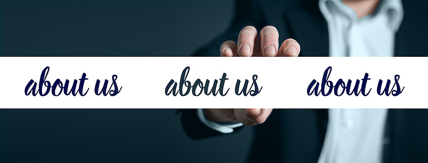 Businessman holding white banner with about us text