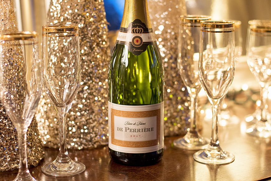 De Perriere Champagne Bottle with Gold-Rimmed Glasses and Glitter Decor