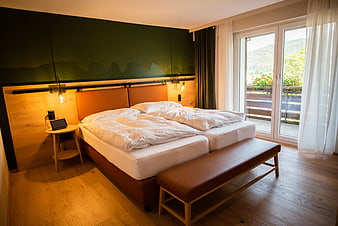 Modern Hotel Room with Mountain View and Wooden Interior