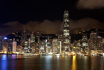 Hong Kong City Skyline at Night with Victoria Harbour Reflections