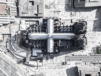 Aerial black and white view of Notre Dame cathedral under reconstruction