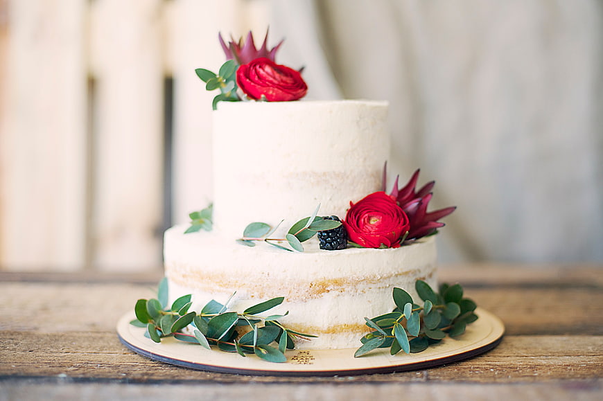 Rustic Naked Wedding Cake with Red Flowers and Eucalyptus