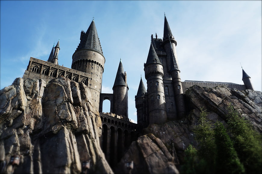 Hogwarts Castle Theme Park Attraction on Rocky Cliff