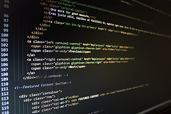 Close-up of HTML code on a computer monitor screen