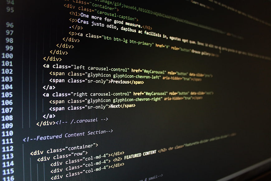Close-up of HTML code on a computer monitor screen
