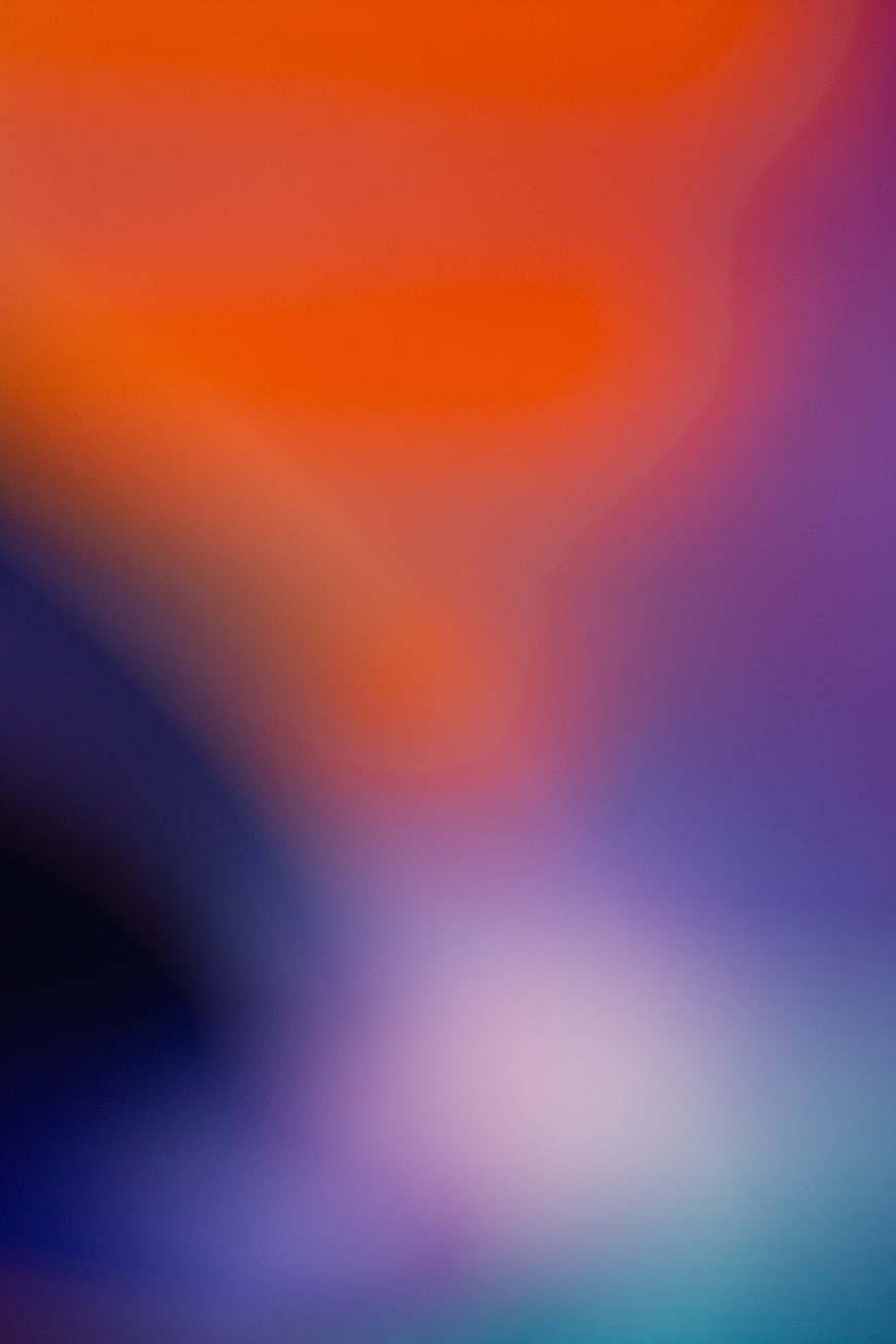 Abstract Blurred Gradient Background with Orange, Purple, and Blue Hues