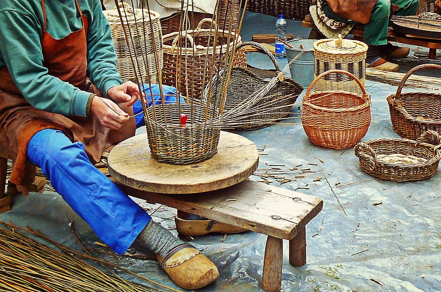 Traditional Basket Weaver Crafting Wicker Baskets