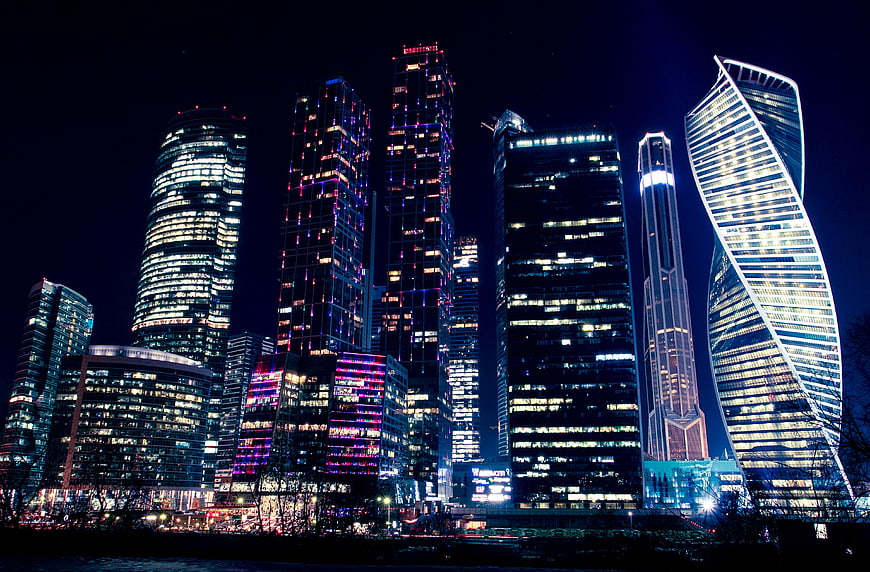 Moscow City skyline at night with illuminated skyscrapers