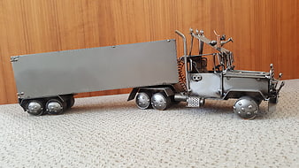 Handmade Metal Truck Model on Carpet