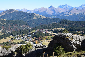 Panoramic Alpine Village View with Rocky Foreground