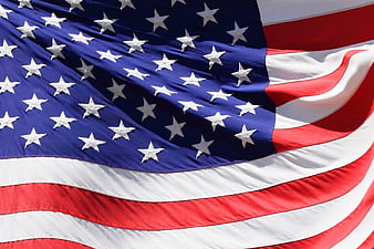 Close-up of waving American flag with stars and stripes