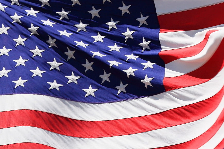Close-up of waving American flag with stars and stripes
