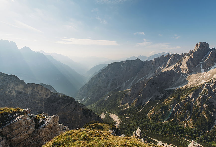 Majestic Dolomites Mountain Landscape with Sunbeams and Valley