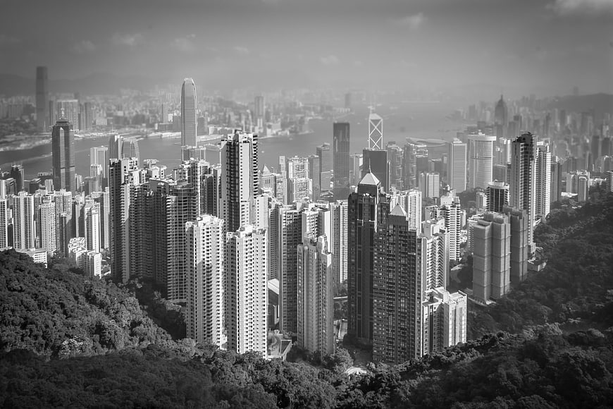Black and white aerial view of Hong Kong city skyline and skyscrapers