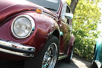 Close-up of Classic Maroon Volkswagen Beetle Front