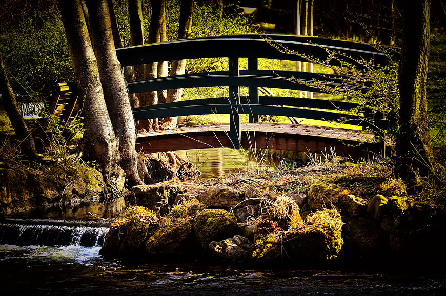 Forest Eith Rocks Romantic wooden footbridge over a forest stream with mossy rocks | Pickpik