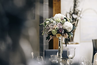 Elegant Wedding Centerpiece with White and Purple Flowers