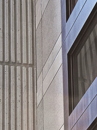 Abstract architectural detail of concrete wall and window frame