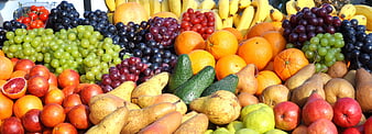 Colorful assortment of fresh fruits at a market display