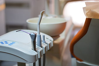 Close-up of dental instruments and equipment in a modern clinic