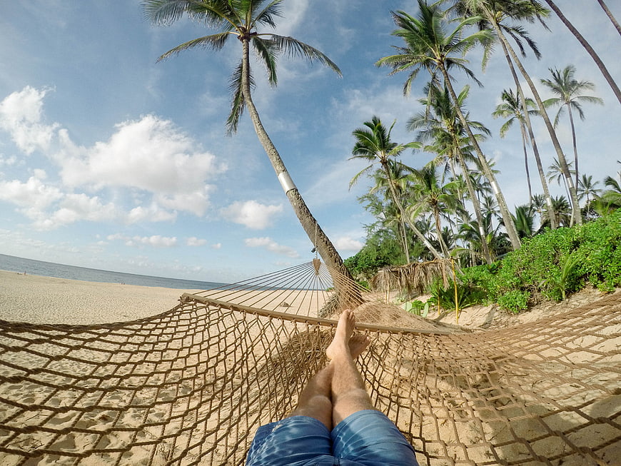 First Person View Relaxing in Hammock on Tropical Beach