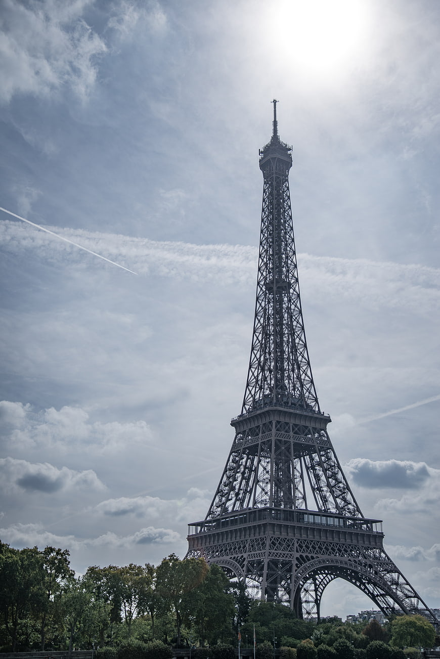 Eiffel Tower Against Cloudy Sky in Paris