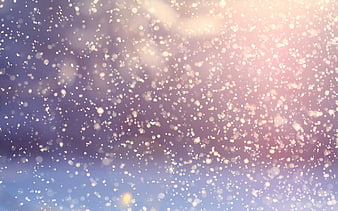 Bokeh Snowfall Background with Soft Pink and Blue Light