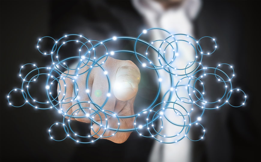 Businessman touching futuristic digital network interface