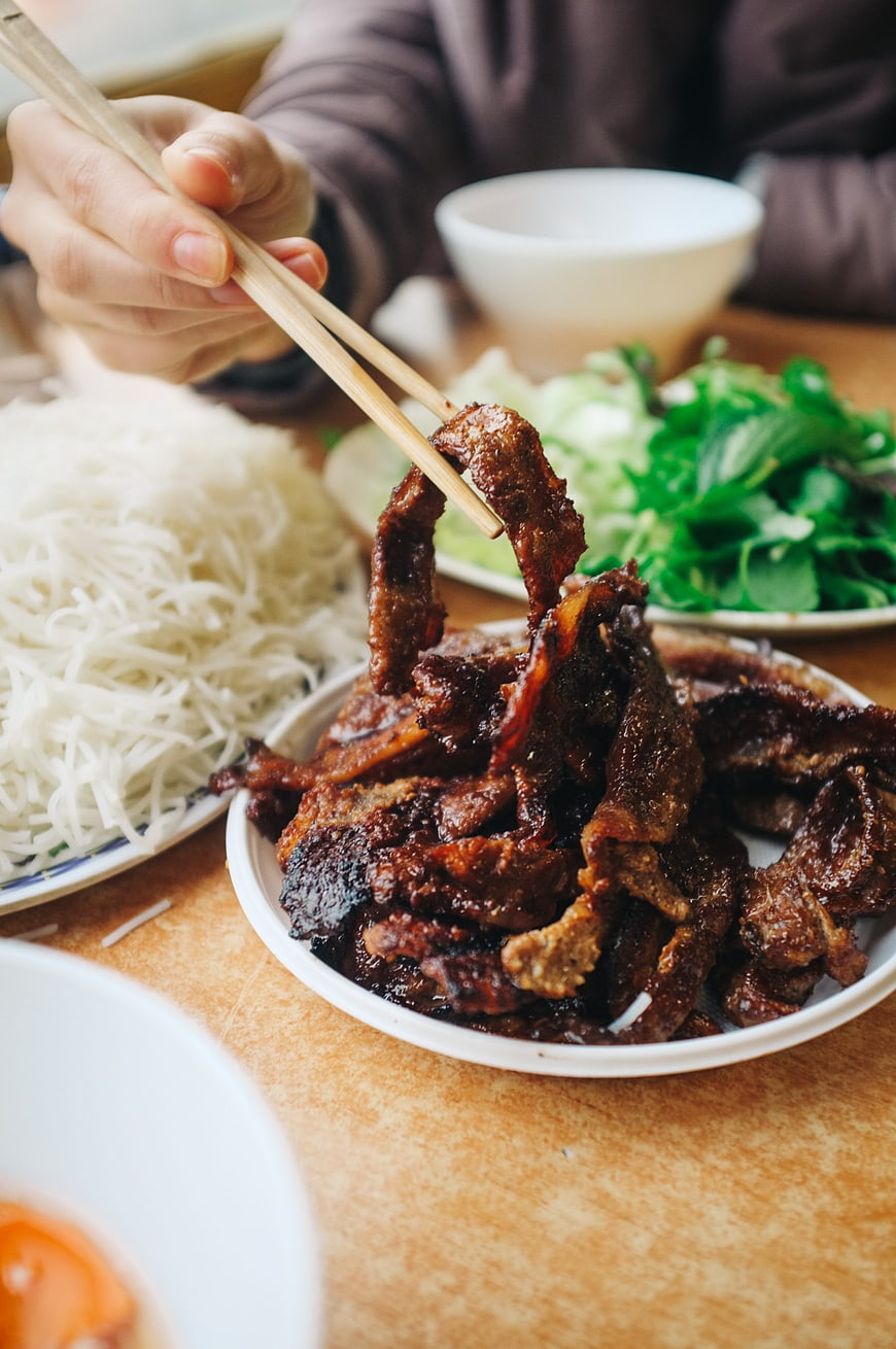 Close-up of Vietnamese Bun Cha with grilled pork and noodles
