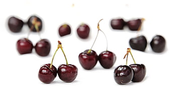 Fresh Ripe Cherries Isolated on White Background