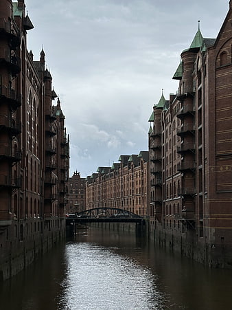 Historic Brick Warehouses Lining a Canal in Hamburg