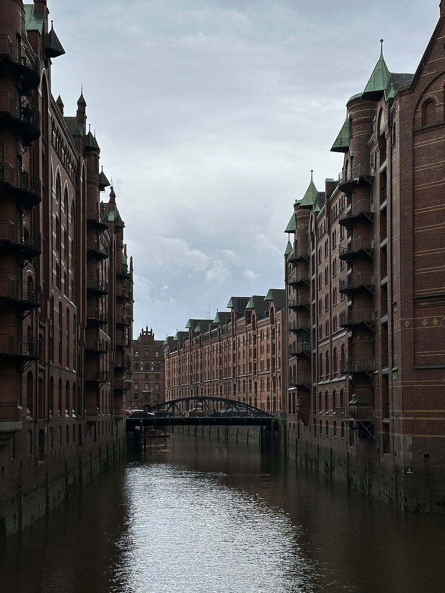 Historic Brick Warehouses Lining a Canal in Hamburg