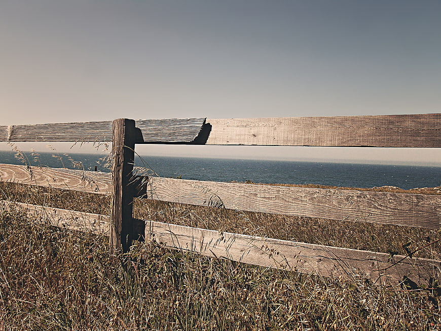 Weathered wooden fence overlooking the ocean