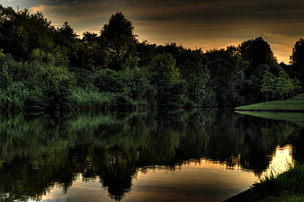 Dramatic HDR Lake Reflection at Dusk with Forest