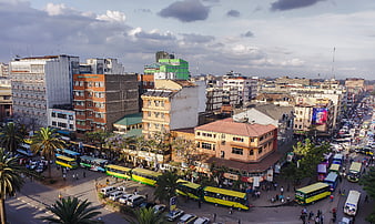 Aerial View of Busy Nairobi Street with Yellow Buses
