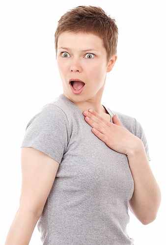 Surprised woman with short hair on white background