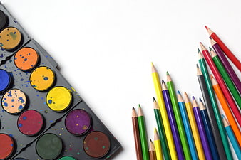 Colorful Art Supplies Flat Lay with Watercolors and Pencils