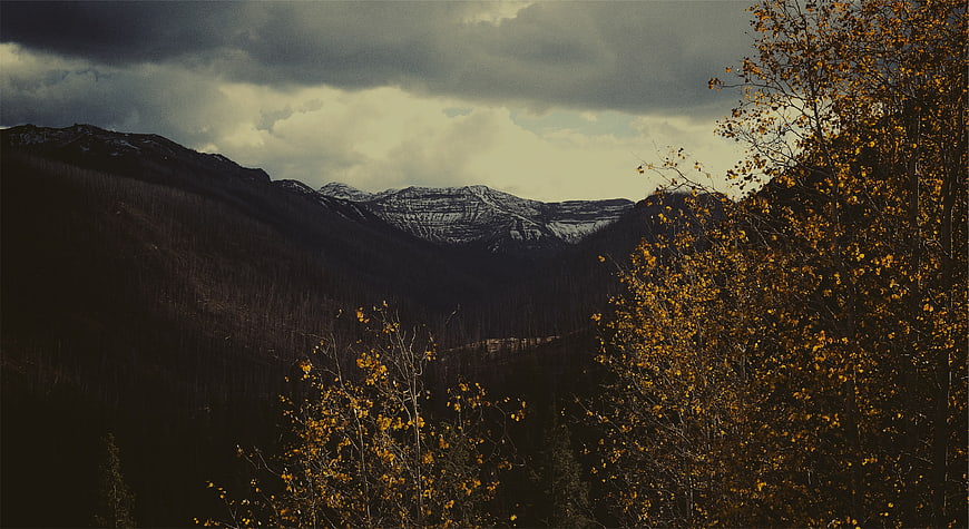 Dramatic Autumn Mountain Landscape with Golden Aspen Trees