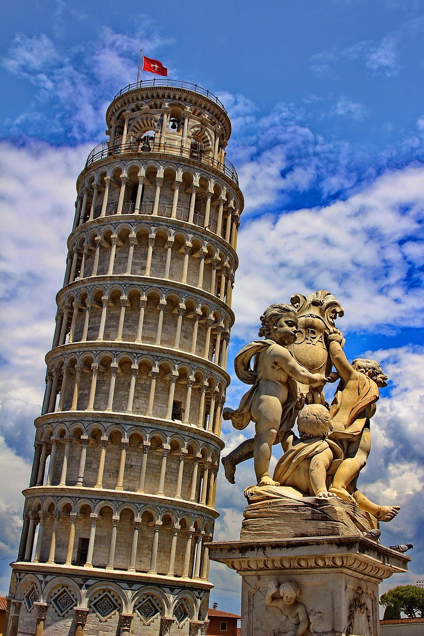 Leaning Tower of Pisa and Fountain Sculpture in Italy
