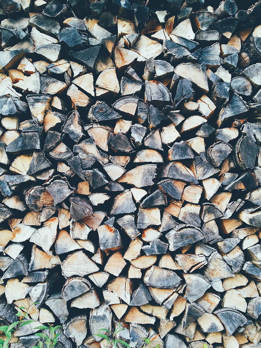 Stacked Firewood Logs Texture Background