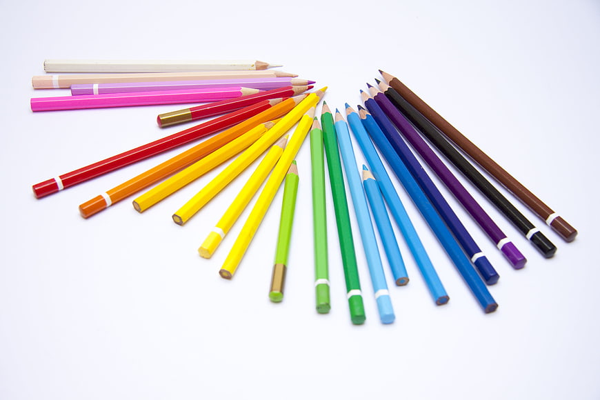 Colorful Colored Pencils Arranged in a Fan on White Background