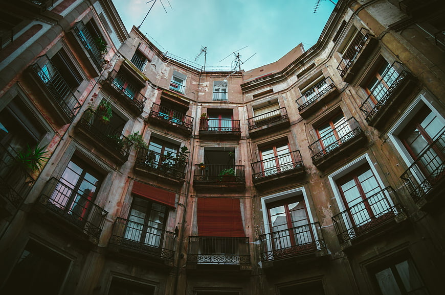 Low angle view of old European apartment building courtyard