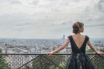 Woman in Black Lace Dress Looking at Paris Skyline