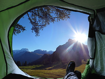 Camping View From Tent With Mountain Landscape And Sun